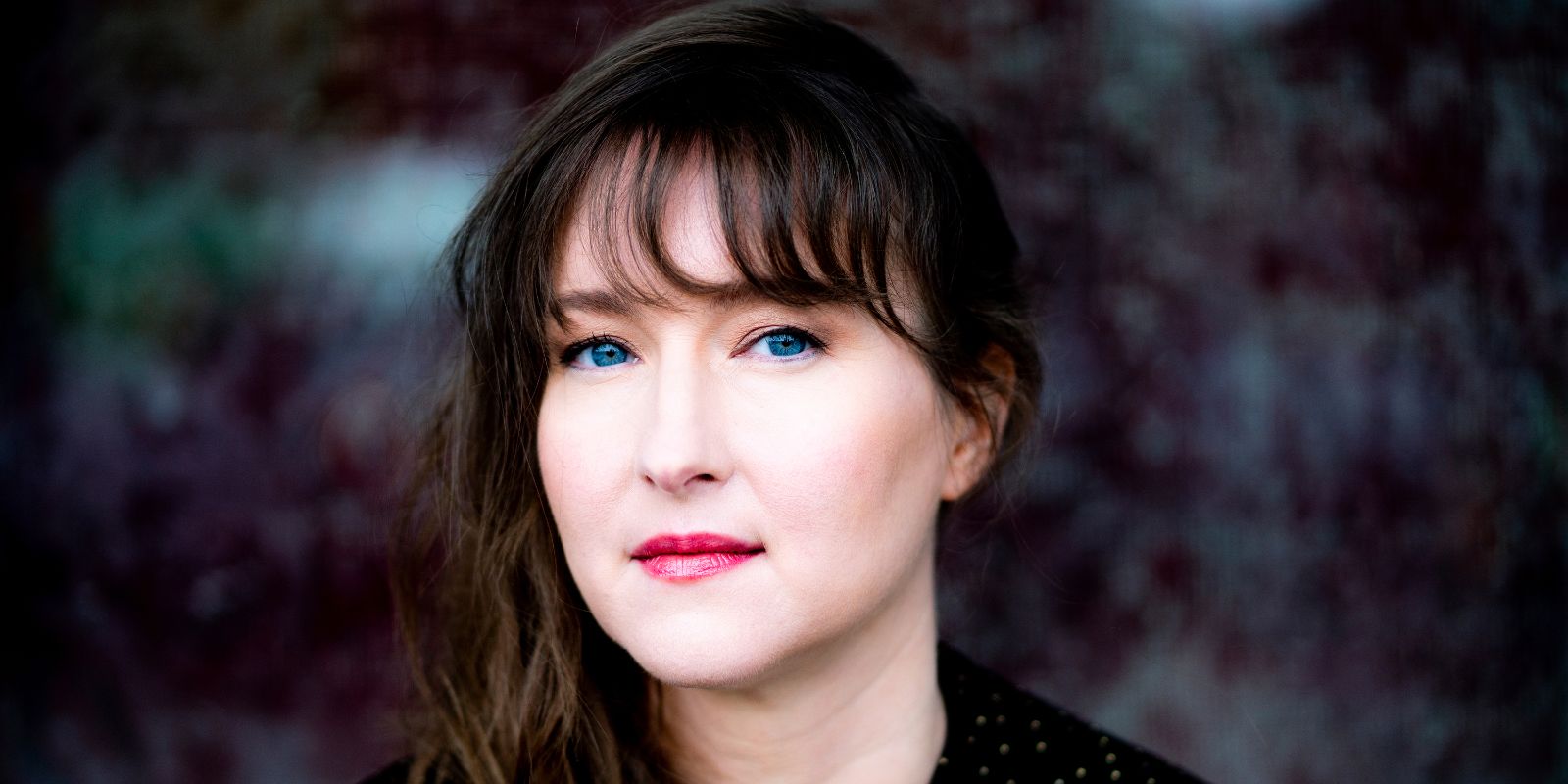 Photograph with composer Lisa Streich, whose dark hair and blue eyes form a striking contrast.