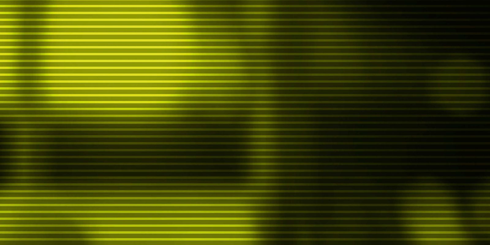 Eine grüne Fläche zeigt leichte abstrakte Konturen.