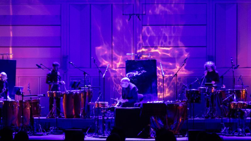 Five percussionists on stage with their instruments